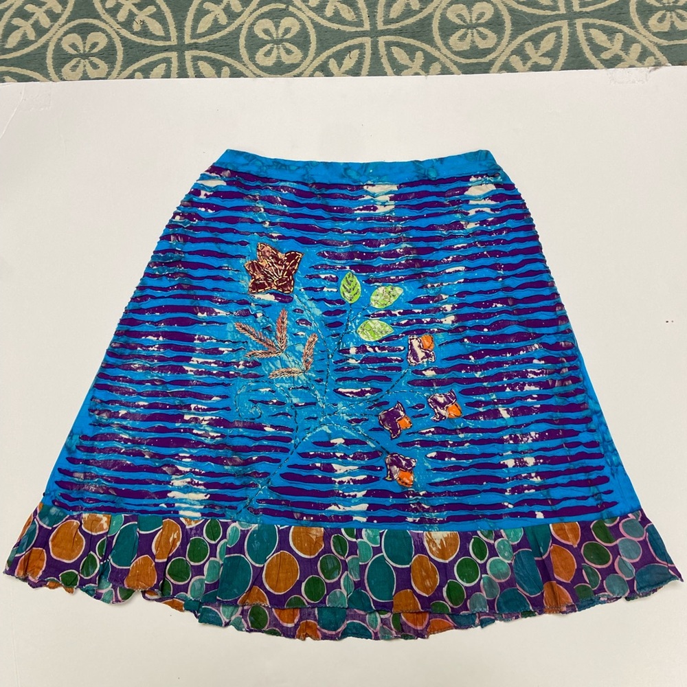 Gypsy Rose vintage blue mini skirt with embroidered floral patterns